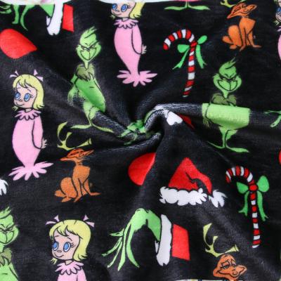 China Anti Static Black Color Christmas Grinch Printed Cartoon Blanket Licensed Character Minky Fabric for sale