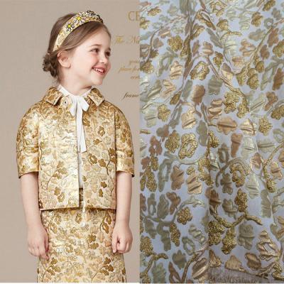 China Anti-Pull Women Kids Dresses Designers Floral Polyester Gold Color Graphic Fabric Brocade Metallic Jacquard Fabric for sale