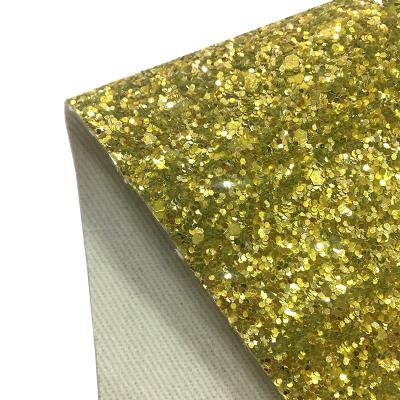 China Abrasion-Resistant Glitter Fabric For Glitter Bows Chunky Glitter Vinyl For Bow Bags Leather Fabric for sale