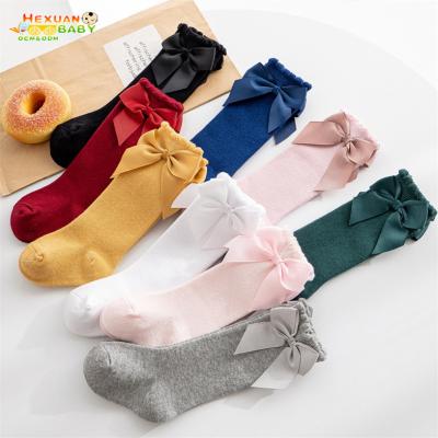 China 2021 Breathable Spring Style Spanish Knee High Baby Kids Girls Dress Socks With Velvet Bow for sale