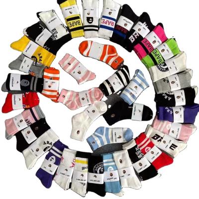 China Breathable Color Cotton Polyester Fiber Nylon Sport Socks Logo Mens Bape Socks White Black Gray Casual for sale