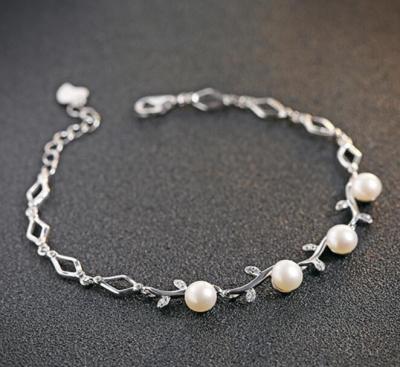 China Fashionable Lozenge Freshwater Pearl Olive Branch Style Korea Wholesale Price Magnetic Bracelet Women for sale