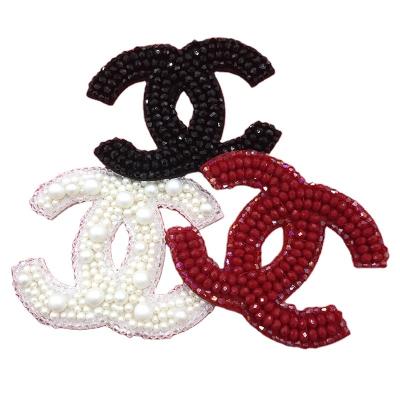 China Cheap price fashion embriodery patch for clothes fashion brand handmade accessories double C heavy industry diamond studded beads patch fabric glue decorative decals for sale