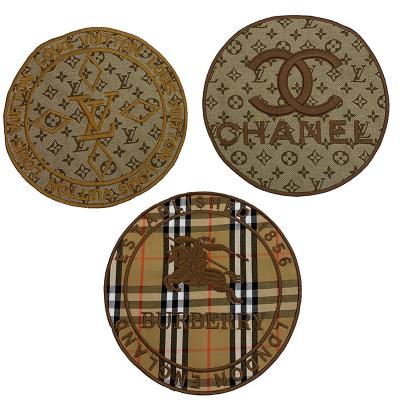 China Cheap price fashion embriodery patch for new clothing double cc letter centaur embroidery patch sweater T-shirt down coat clothing accessories decorative fabric sticker for sale