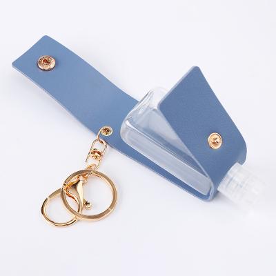 China Decoration for Hand Sanitizer Bottle Leather Hand Keys Anti-wolf Spray Bottle Key Chain Pendant Case for sale