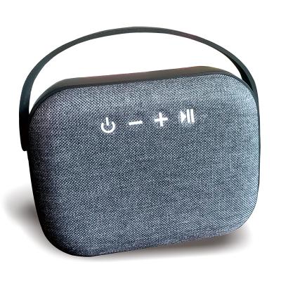 China No Best Woven Fabric Stereo Handbag Wireless Speaker With Rubber Carry Handle for sale