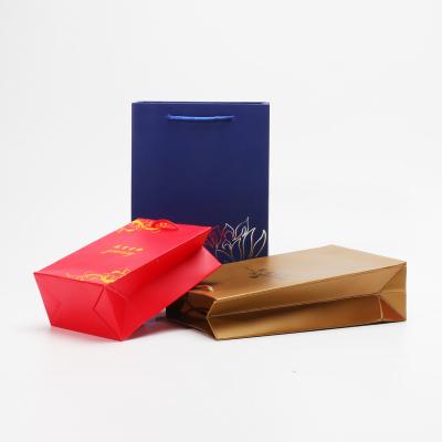 China Fashionable Simple Design Appearance Handle Gift Shopping Delicate Packaging Paper Bag With Logo Print for sale