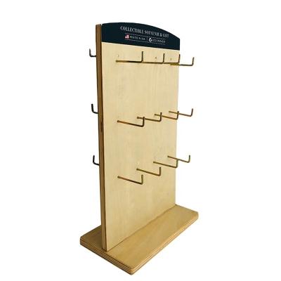 China Can be customized wooden turned main chain display rack retail store promotion counter top with hooks for accessories for sale