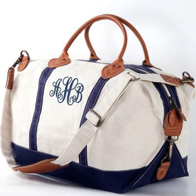 China Fashion Monogram Duffel Bag Leather Handles Adjustable Shoulder Strap Monogram Canvas Weekender Bag for sale