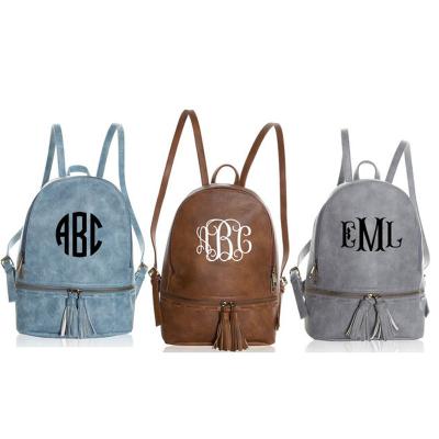 China Girls Waterproof Mini Monogrammed Leather Mini Backpack Women Tassel Backpack Zipper Closure for sale