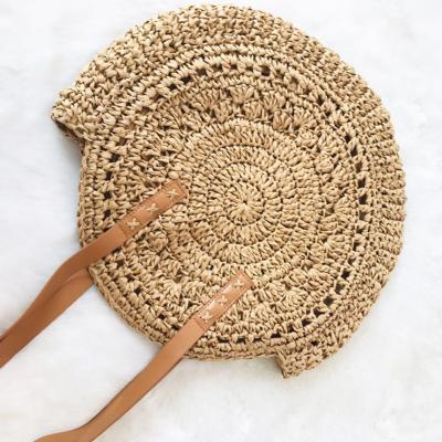 China Portable Ladies Handmade Woven Handbags Women Shoulder Bag Summer Wholesale Round Straw Beach Bags for sale