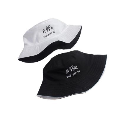 China Custom Reversible Black And White Bucker Hat Character Bucker Bilateral Bucket Hats for sale