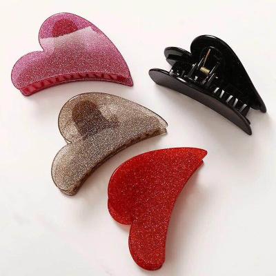 China Women Girls Acrylic Heart Shape Glitter Acrylic Hair Claw Clip for sale