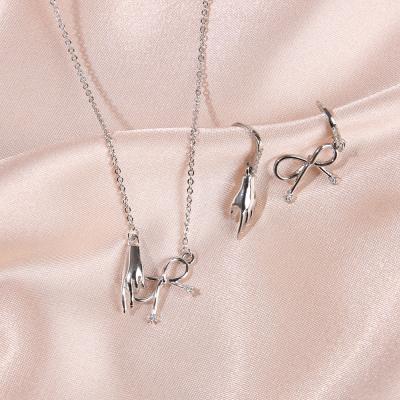 China WeSparking EMO Jewelry Set Design Copper Zircon Drop Earrings FASHION Fish Hook Pendant Necklace Palm Bow For Women for sale