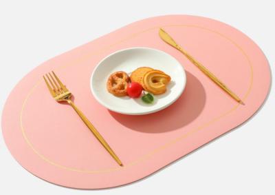 China Convenient and user-friendly oval shaped Western food mat with anti slip particle leather table mat for hotel and home for sale