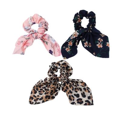 China Fashion Ring Leopard Rabbit Ear Hair Soft Floral Hair Accessories Bow Tie Elastic Hair Band Scrunchies For Women for sale