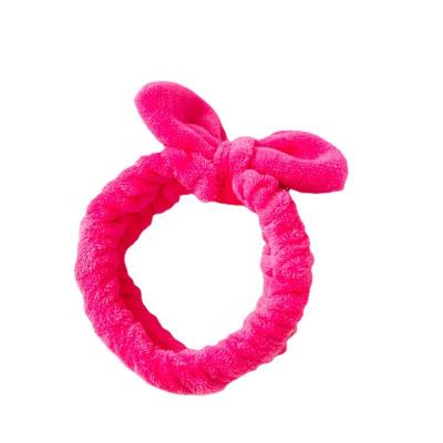 China Fashion Cute Pure Color Flannel Cute Bunny Ear Elastic Hair Band Bow Face Shower Wash Headbands for sale