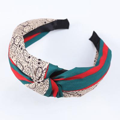 China Fashion Headwear Retro Vintage Style Cross Knotted Fabric Printed Wide Headbands For Women for sale