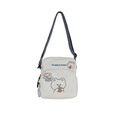 China Custom cool high capacity harajuku children student canvas children japanese cute messenger bag small cool shoulder bag for sale