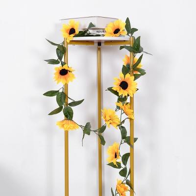 China Hot Sale Amazon Fabric Sunflower Vine Artificial Flower Wall Decoration 2m Long Sunflower Silk Warm Garland for sale