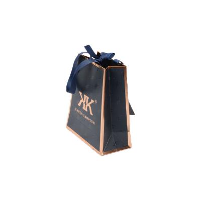 China Rose Gold Foiled Stamping Matte recyclable Art Paper Bag With Ribbon handles gift cheap washable paper bag for sale