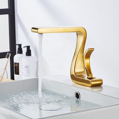 China Other Gold Bathroom Faucet Mixer Tap New Modern Brass Hot And Cold Faucet Basin Faucet for sale