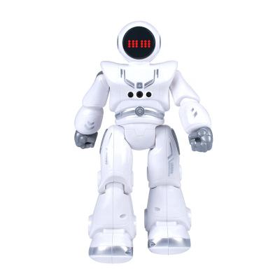 China Kids Material Eco-friendly Smart Induction Programming Gesture Sensing Remote Control Musical Dancing Smart Robot Walking Toys for sale