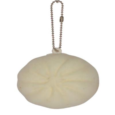 China Custom Soft Cheap PU Simulated Pork Squishy Roll BBQ Steam Stuffed Bread Key Chain for sale