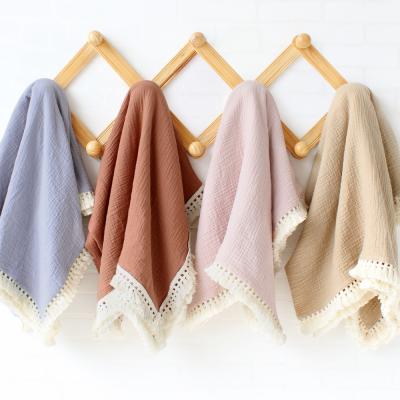 China Anti-pilling 2021 New Gauze Plain Color Blanket 100%Cotton Baby Muslin Cotton Ply Solid Blankets With Tassels for sale