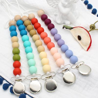 China BPA Free Various Colors Eco Friendly Logo Teething Toys Pacifier Clip With Silicone Teether Color Mix Chain for sale