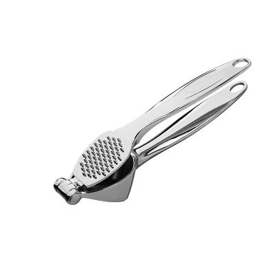 China Multifunctional Zinc Alloy Garlic Grinder Set Kitchen Tableware Manual Garlic Press for sale