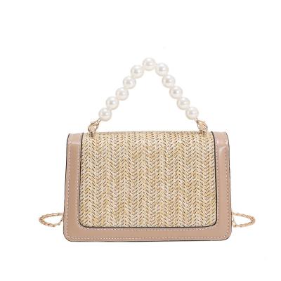 China Fashoion Straw Woven Ladies Pearl Handle Luxury Flap Handbags Chains Beach Shoulder Beach Cross Cross - 2022 Designer Body Bags Women Hand Bags for sale