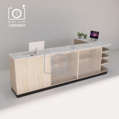 China SHIJIE DISPLAY Expandable Custom Design White High Quality Wooden Reception Lounge Reception Desk for sale