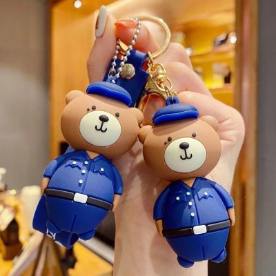 China Cute Key Chains Ring Creative Car Bag Phone Key Chain Bear Key Chain Women Man Children Cartoon Police Bear Key Chain Woman for sale