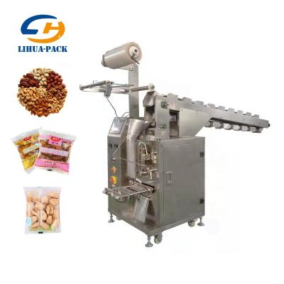 China Food Automatic Bucket Chain Type Mixed Nuts Granule Packing Machine for sale