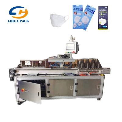 China Food Automatic 4 Row KF94 Fish Mask Packing Machine Medical Disposable Surgical Mask Packing Machine for sale