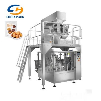 China Doy Package Pouch Automatic Rotary Cashew Nut Raisin Food Packing Machine Price for sale