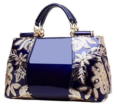 China PU Floral Pattern Splicing Patent PU Leather Cross - Body Handbag for sale