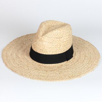 China Hot Sale Eco-Friendly Summer Sunshade Oversized Wide Brim Panama Straw Hats Raffia Hat For Women Mens Beach Vacation for sale