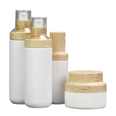 China Cosmetic packaging 120ml luxury logo bamboo airless cosmetic plastic bottles custom size free sample for sale