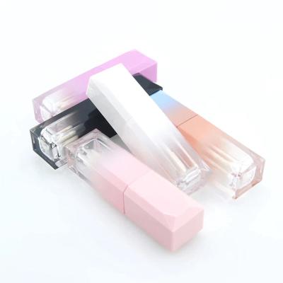 China Cosmetic Luxury Custom Black Gradient Color Lip Gloss Containers Clear Tube With Big Wand Brush for sale