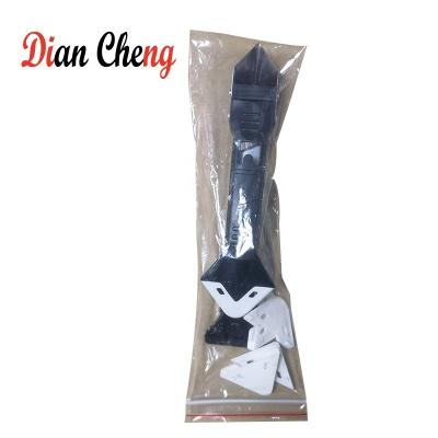 China Can be reused multifunctional rubber shovel, silicone rubber squeegee, beautiful corner seam shovel for sale