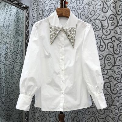 China New 2021 Spring Viable Elegant Pearl Beaded White Shirt Straight Acute Loose Collar Blouse Women Long Sleeve Tops for sale