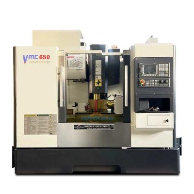 China Máquina automática de fresagem por CNC Vmc650 4 eixos Máquina de fresagem por CNC Turret para metal à venda