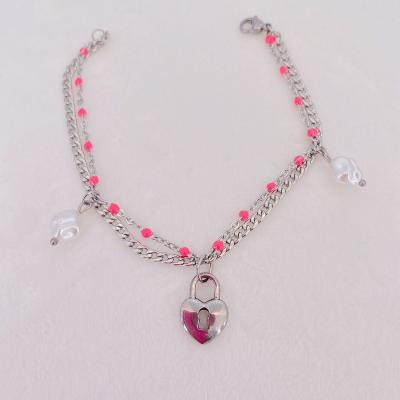 China Fashionable and Exquisite Vintage New Women's Stainless Steel Bracelet Style Pearl Hollow Heart Stainless Steel Bracelet for sale