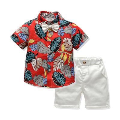 China Wholesale 2pcs Casual Leaves Printed Kids Beach Wear Baby Clothes Set Boy Clothes for sale