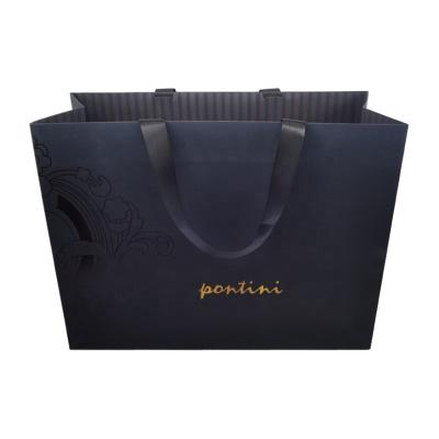 China Recyclable Luxury Goods Recyclable Luxury Shopping Bag Shopping Mall Ribbon Black Rope Coating UV Paper Bags for sale