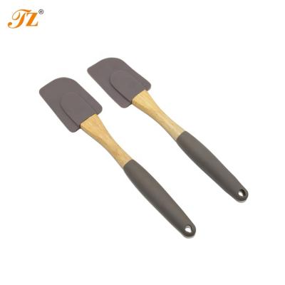 China Viable Wholesale Kitchen Nonstick Silicone Cooking Utensil Silicone Baking Spatula With Wooden Handle for sale