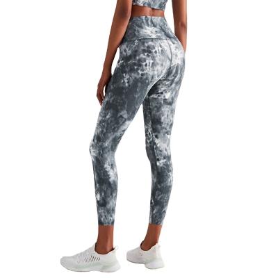 China Breathable tie dyed nylon yoga pants ink printing peach buttocks fitness high waisted soft leggings for sale