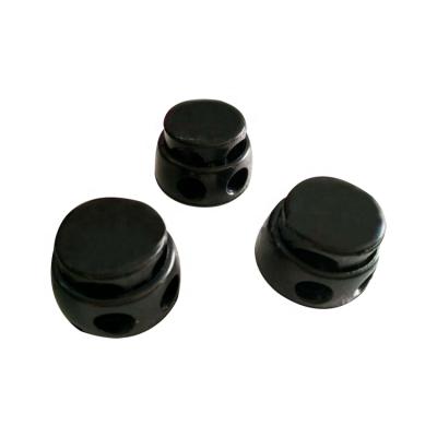 China Big Round Ball Rope Nickel Free Black Plastic Lock Rocks 2-Hole Plugs 5mm Bungee Shock Rope for sale